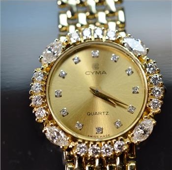 34.9 Grams 14K Gold 1.10Ct t.w. Diamond Cyma Watch
