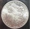 Tough Date, Brilliant Uncirculated 1884-CC GSA Hoard Morgan Silver Dollar In Original U.S. Govt. Case - NGC Graded MS-64