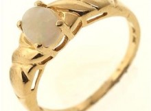 2.4 Gram 14kt Yellow Gold Ring With Opal Style Accent