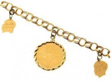 12.9 Gram 14kt Yellow Gold Bracelet With Charms