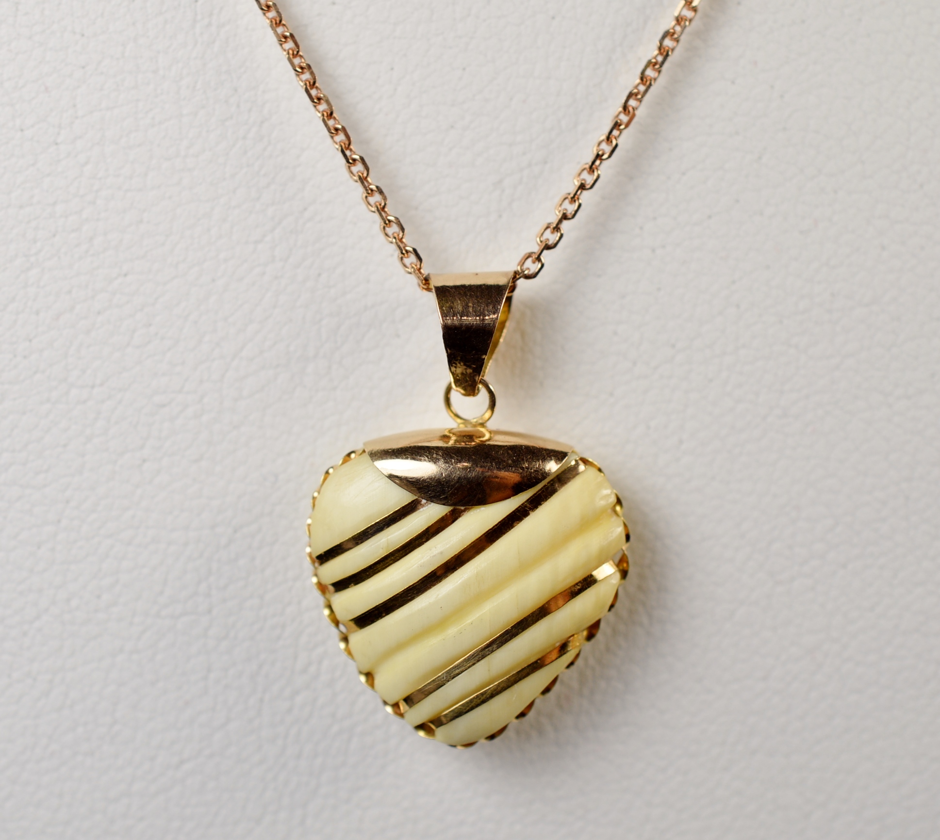 $500 Retail 14K Rose Gold Heart With Gold Stripes Pendant
